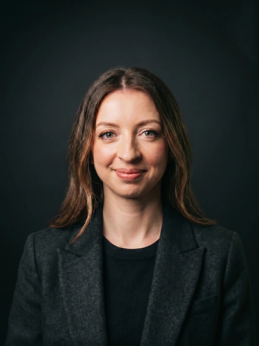 Anna Grynko, Senior Product Designer, working at her studio desk