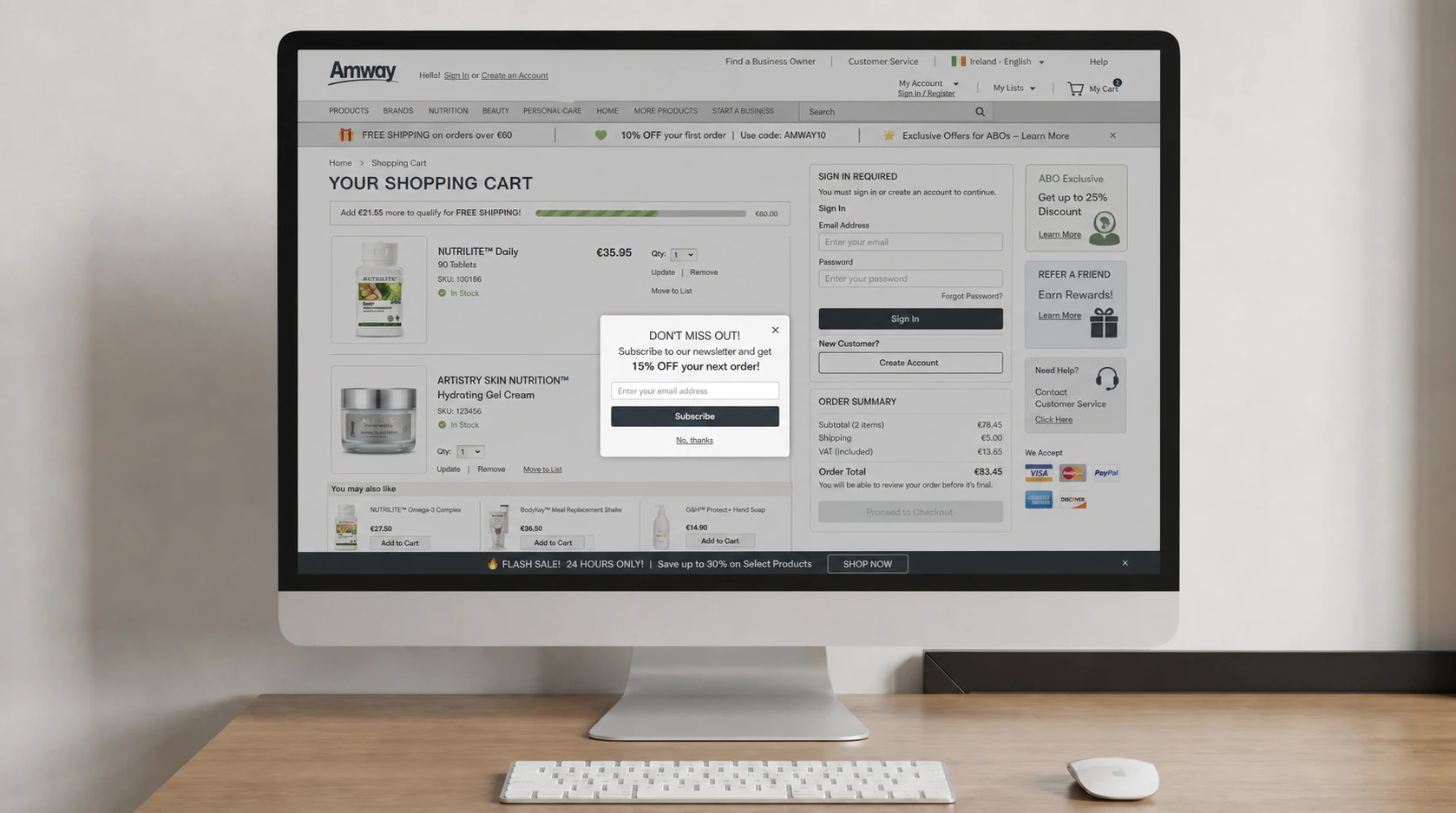 Legacy Amway cart with a mandatory Sign In Required gate blocking checkout, no guest option, plus a newsletter popup, stacked promo banners, and a dense low-contrast layout