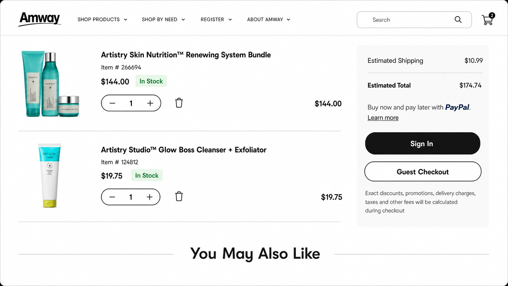 Amway cart with two items — a bundle and an add-on cleanser — showing in-stock tags, quantity steppers, an order summary with Sign in and Guest Checkout, and a You May Also Like cross-sell row